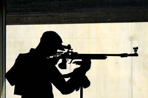 Lazar Kovacevic competes in 50m rifle 3 positions men's shooting